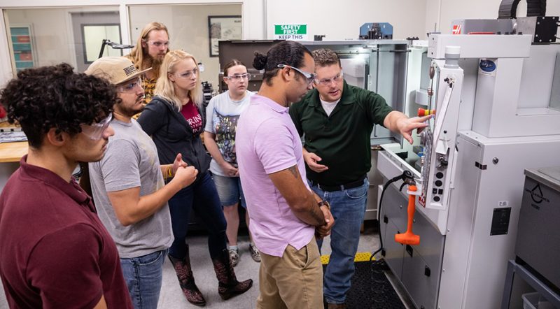 Instructor and students in class