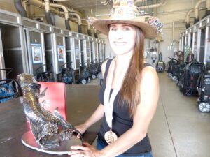 Sarah Stork with 1st place medal for Welded Steel Sculpture “Tarpon”